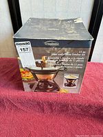 Box front showing Trudeau meat and cheese fondue set