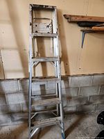 Full front view of 6 ft aluminum step ladder