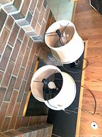 Overhead view showing pair of lamps with drum shades