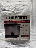 Front of retail box showing Chefman slow cooker