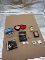Entire lot overview showing all jewelry items arranged on board