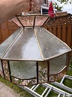Overall view of pendant showing glass panels and frame