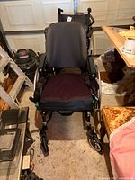 Front view showing entire wheelchair structure