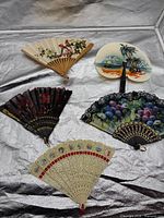 All five folding fans laid out