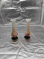 Front view of the two matching vases showing color and shape