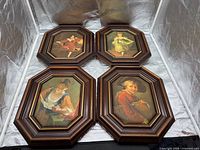 All four framed prints displayed together