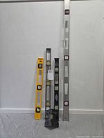 Four vertical levels and corner level displayed against wall