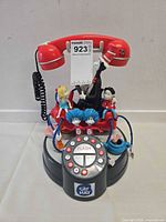 Front view of Cat in the Hat novelty telephone showing figurines and keypad