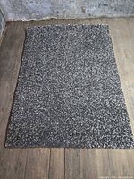 Full view of IKEA VINDUM rug on wooden floor