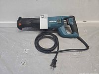 Left-side view of Makita JR3050T with cord coiled