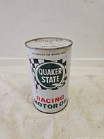 Front view showing Quaker State logo and Racing Motor Oil text