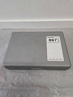 Closed gray plastic carry case
