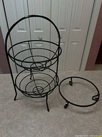 Overall view of two-tier stand and separate single-tier ring