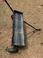 Top view of dethatcher showing weight tray and tow bar