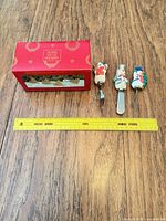 Overall lot with box, three utensils and ruler for scale