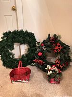 Both wreaths and two baskets grouped