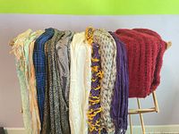 All scarves, shawls and wraps draped on rack
