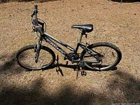 Left side view of Omega 26-inch adult bike entire frame visible