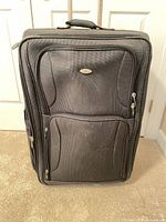 Front view of Olympia black softside suitcase