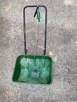 Top view of spreader showing hopper interior and control cable
