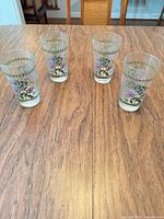 Four Clematis hi-ball glasses on tabletop