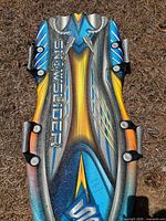 Top view of Snow Slider sled showing graphic design and side handles