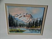 Full view of watercolor within mat and frame