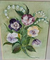 Close view of painted flowers and artist signature