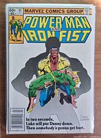 Front cover in bag and board showing full artwork and condition