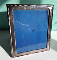 Front view of silver plated frame showing beaded edge