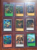 Fronts of nine TMNT cards in sleeves