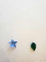 Both suncatchers side by side on background