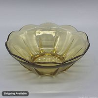 Top view of amber scalloped glass bowl