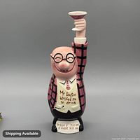 Front view of ceramic man decanter showing full figure and humorous text
