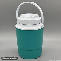 Front view of teal plastic jug with white lid and handle