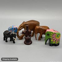 All six elephant figurines front view