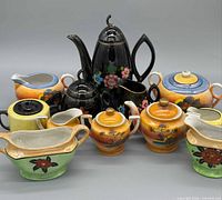 Group shot of all twelve porcelain pieces