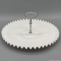 Full view of Fenton milk glass tray with handle