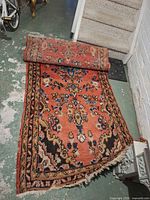 Full view of rolled rug showing size and pattern