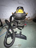 Shop-Vac with hose, wands and floor nozzle