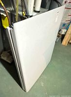 Table folded and standing upright showing full exterior panels