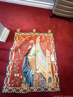 Full tapestry front view on red carpet