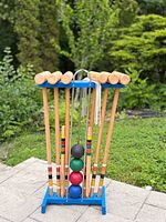 full croquet set in blue stand, front view
