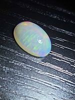 Top view translucent multicolour Ethiopian opal cabochon