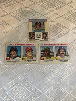 Fronts of all three leader cards displayed on table