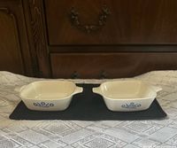 Two square Corning Ware petite pans side by side
