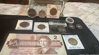 Overall view of all currency items laid out