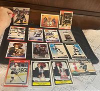 All 15 Gretzky cards laid out in sleeves on black background