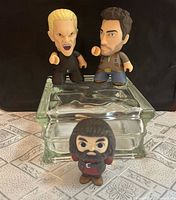 Group shot of all three vinyl figures
