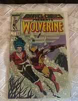 Front cover with Wolverine and Tyger Tiger underwater, issue details visible